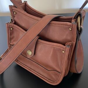 Frye and Co. crossbody bag with zipper top.